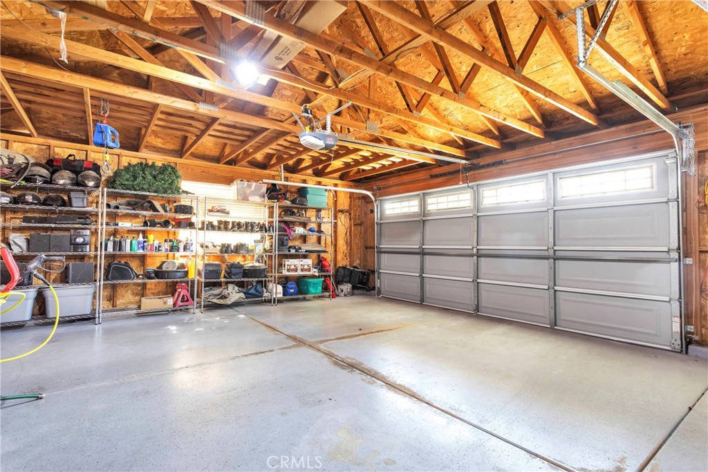 12949 Choco Road Apple Valley, CA 92308 - Photo 33 of 50 a view of a garage with storage