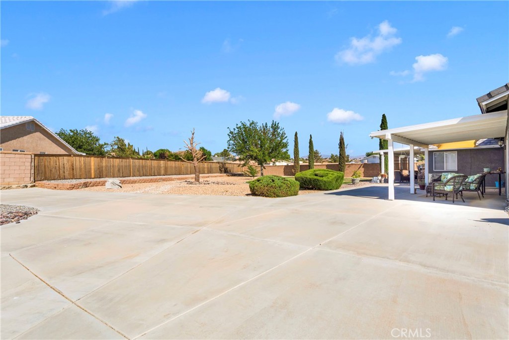 12949 Choco Road Apple Valley, CA 92308 - Photo 40 of 50 a view of swimming pool with outdoor seating