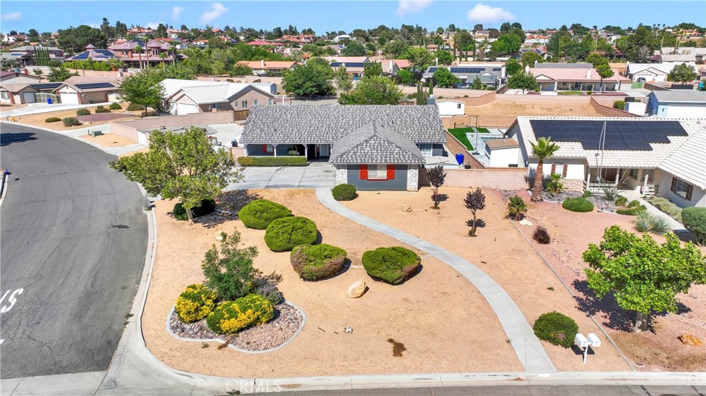12949 Choco Road Apple Valley, CA 92308 - Photo 44 of 50 an aerial view of a house with a garden view