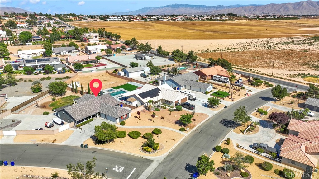 12949 Choco Road Apple Valley, CA 92308 - Photo 47 of 50 an aerial view of residential building and lake view