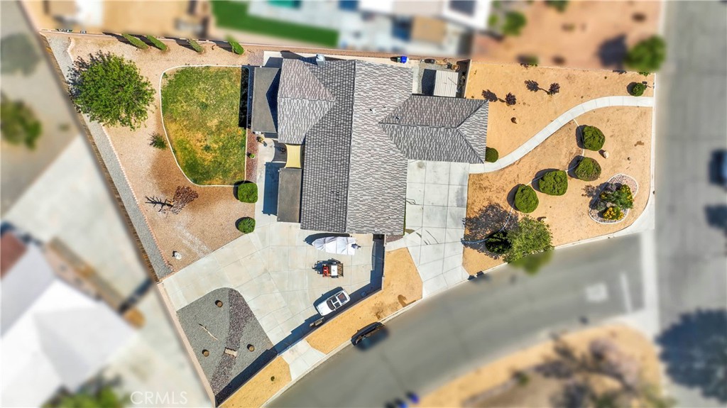 12949 Choco Road Apple Valley, CA 92308 - Photo 48 of 50 an aerial view of a house with a swimming pool