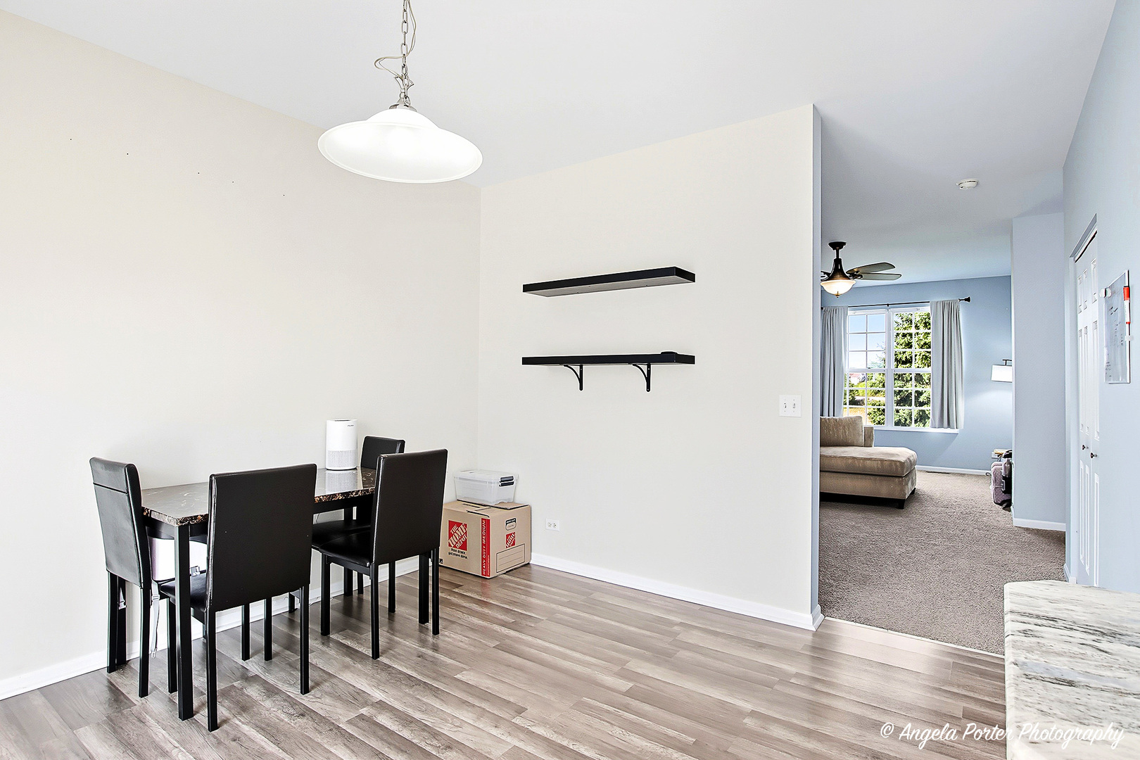 1477 Sedgewood Court Round Lake, IL 60073 - Photo 11 of 29 a view of a dining room with furniture and wooden floor