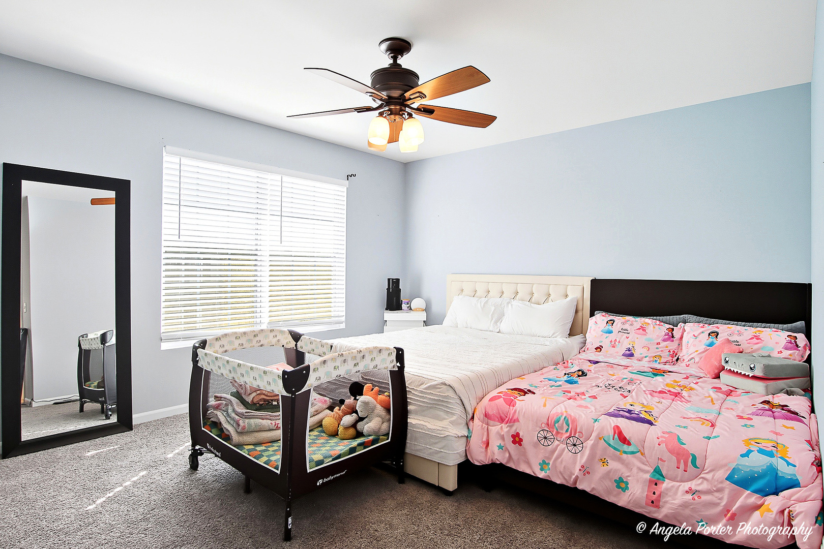 1477 Sedgewood Court Round Lake, IL 60073 - Photo 15 of 29 a bedroom with a bed and a chandelier