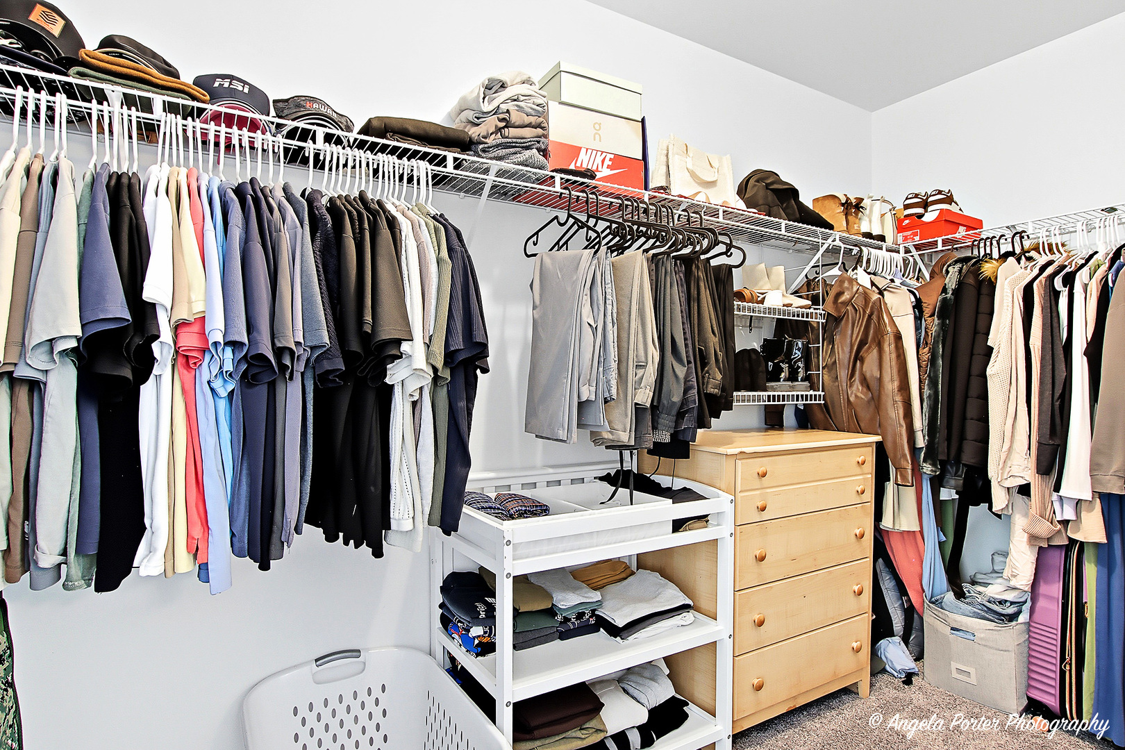 1477 Sedgewood Court Round Lake, IL 60073 - Photo 16 of 29 a view of walk in closet with clothes and shoes