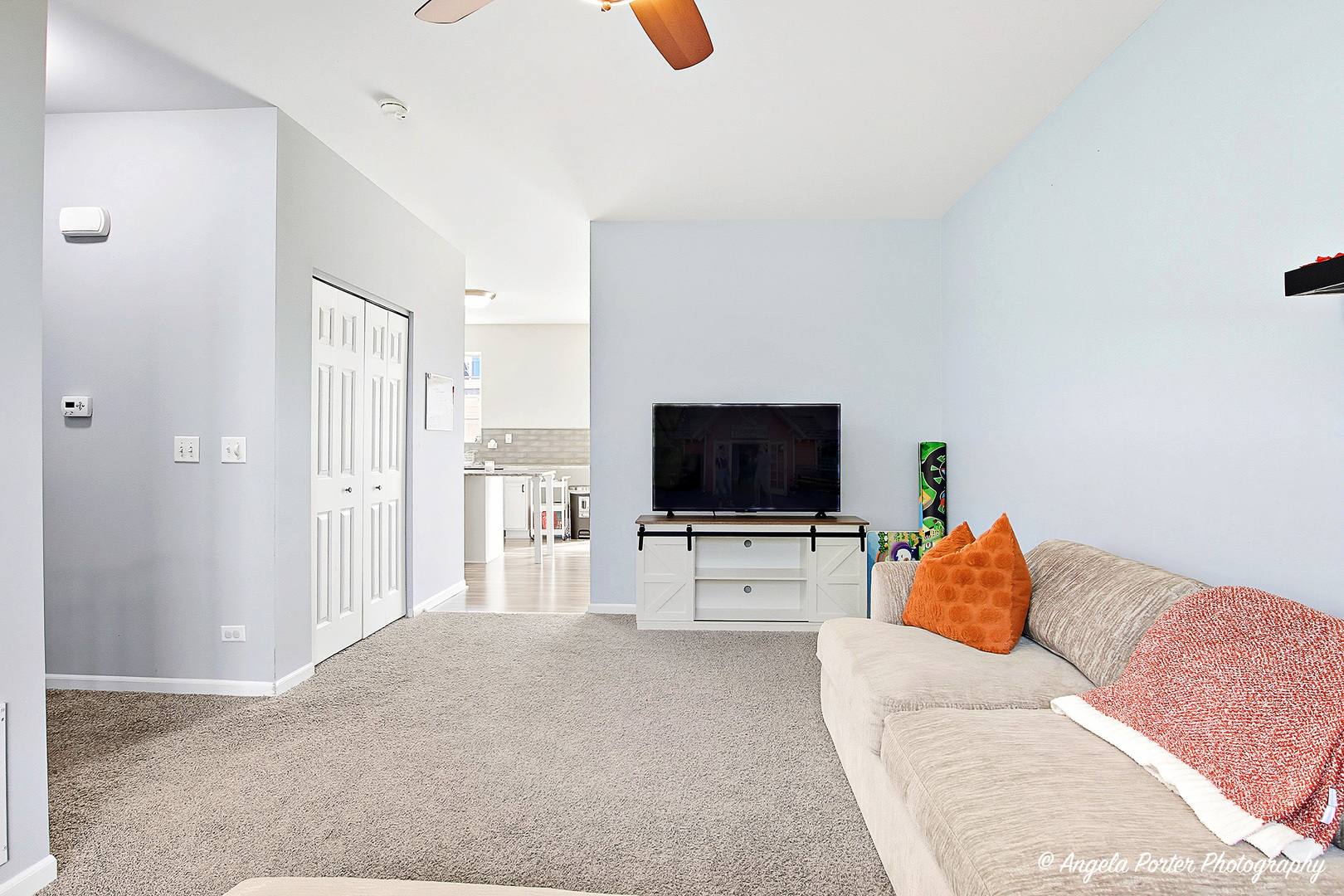 1477 Sedgewood Court Round Lake, IL 60073 - Photo 7 of 29 a living room with furniture and a flat screen tv