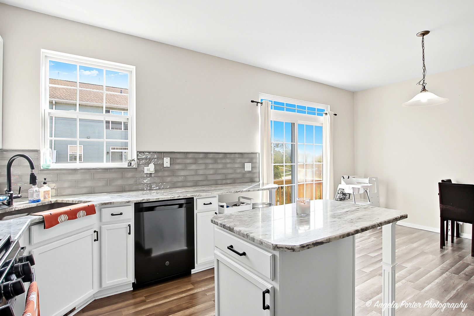 1477 Sedgewood Court Round Lake, IL 60073 - Photo 10 of 29 a kitchen with a sink stove and cabinets