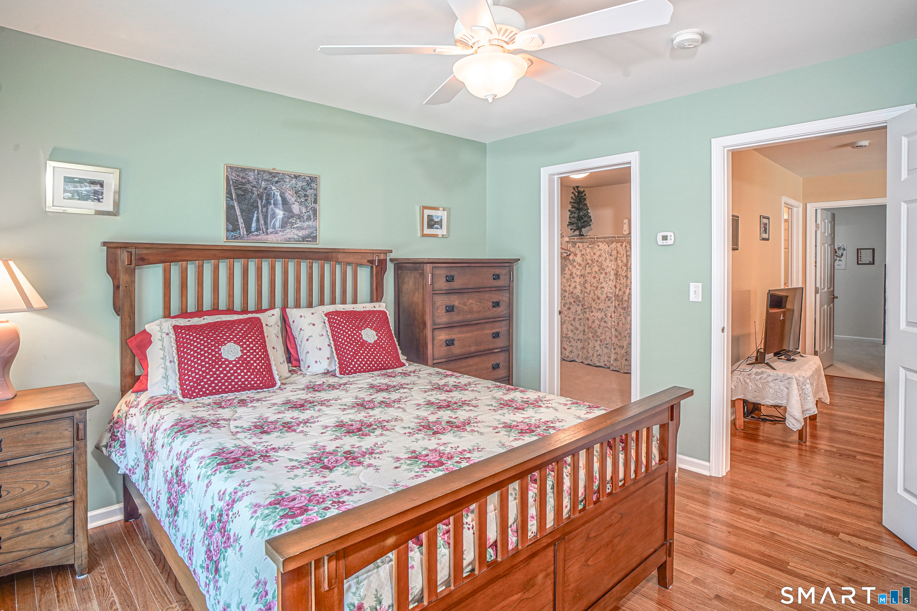 6 Lilac Lane, Unit 6 Prospect, CT 06712 - Photo 25 of 40 Upper level 2nd bedroom with ceiling fan, hardwood floors, and separate zone heating /cooling.