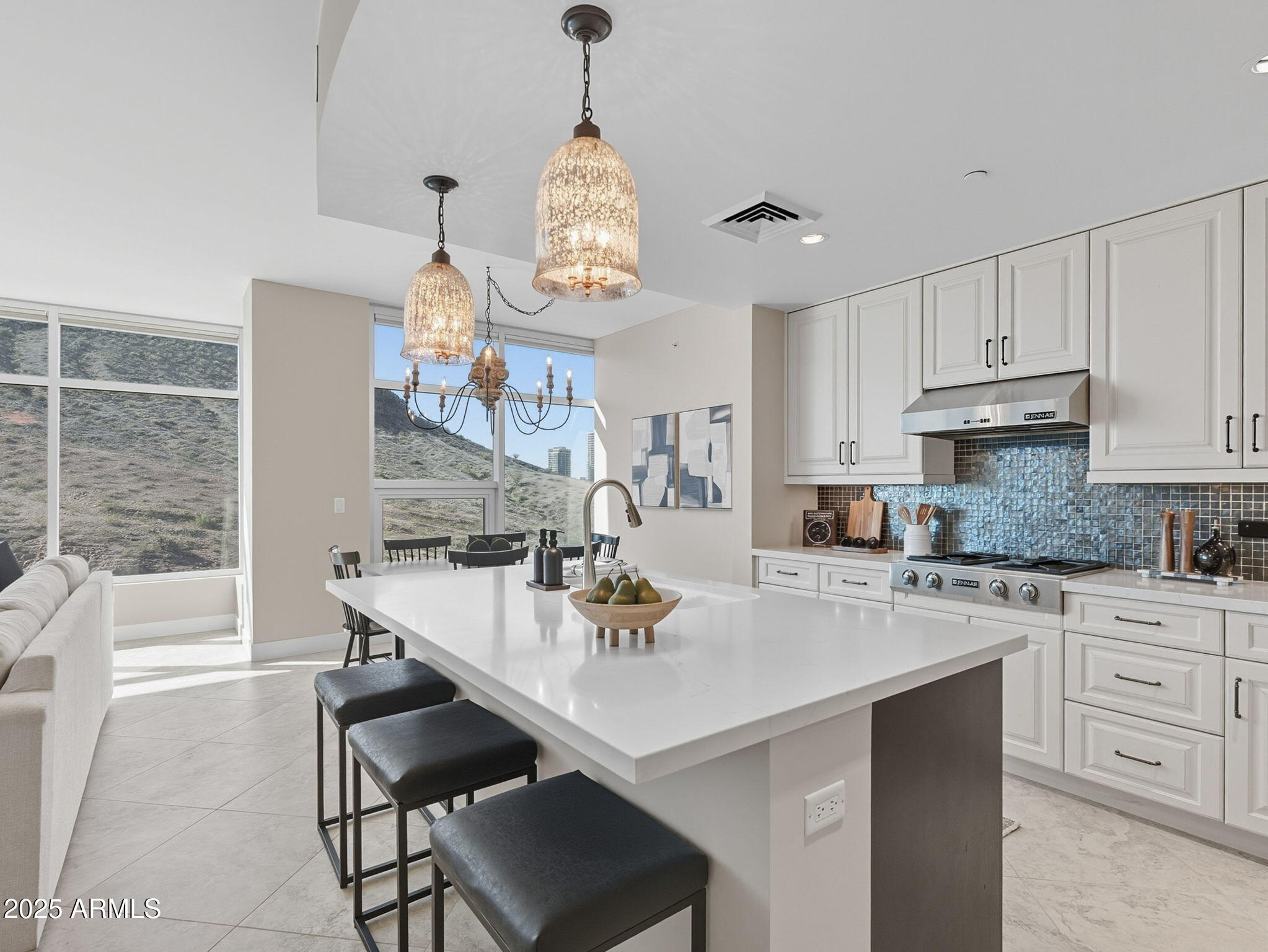 140 East Rio Salado Parkway, Unit 512 Tempe, AZ 85281 - Photo 13 of 41 a kitchen with cabinets appliances and a center island