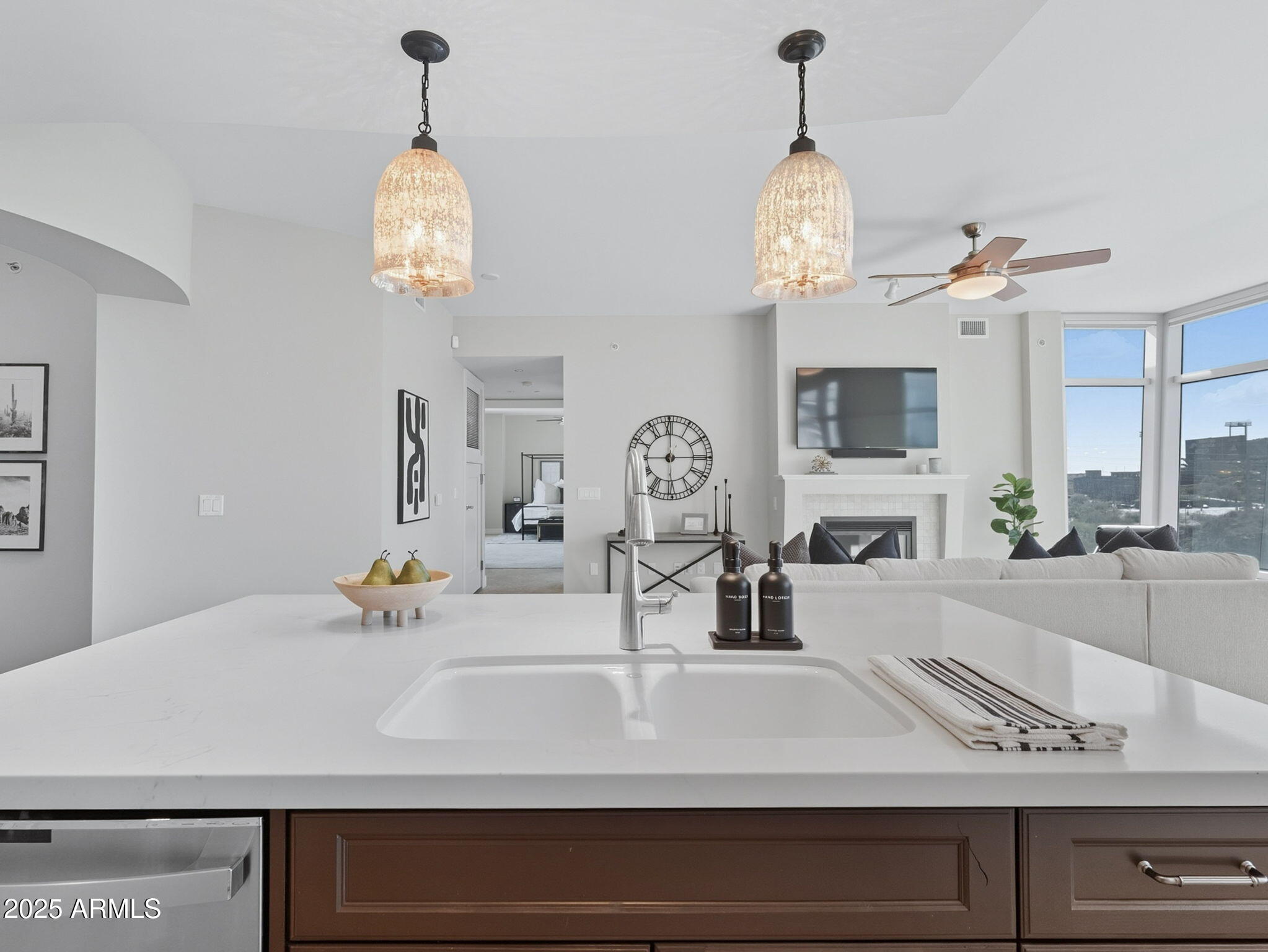 140 East Rio Salado Parkway, Unit 512 Tempe, AZ 85281 - Photo 14 of 41 a kitchen with a sink and a mirror with the wooden floor