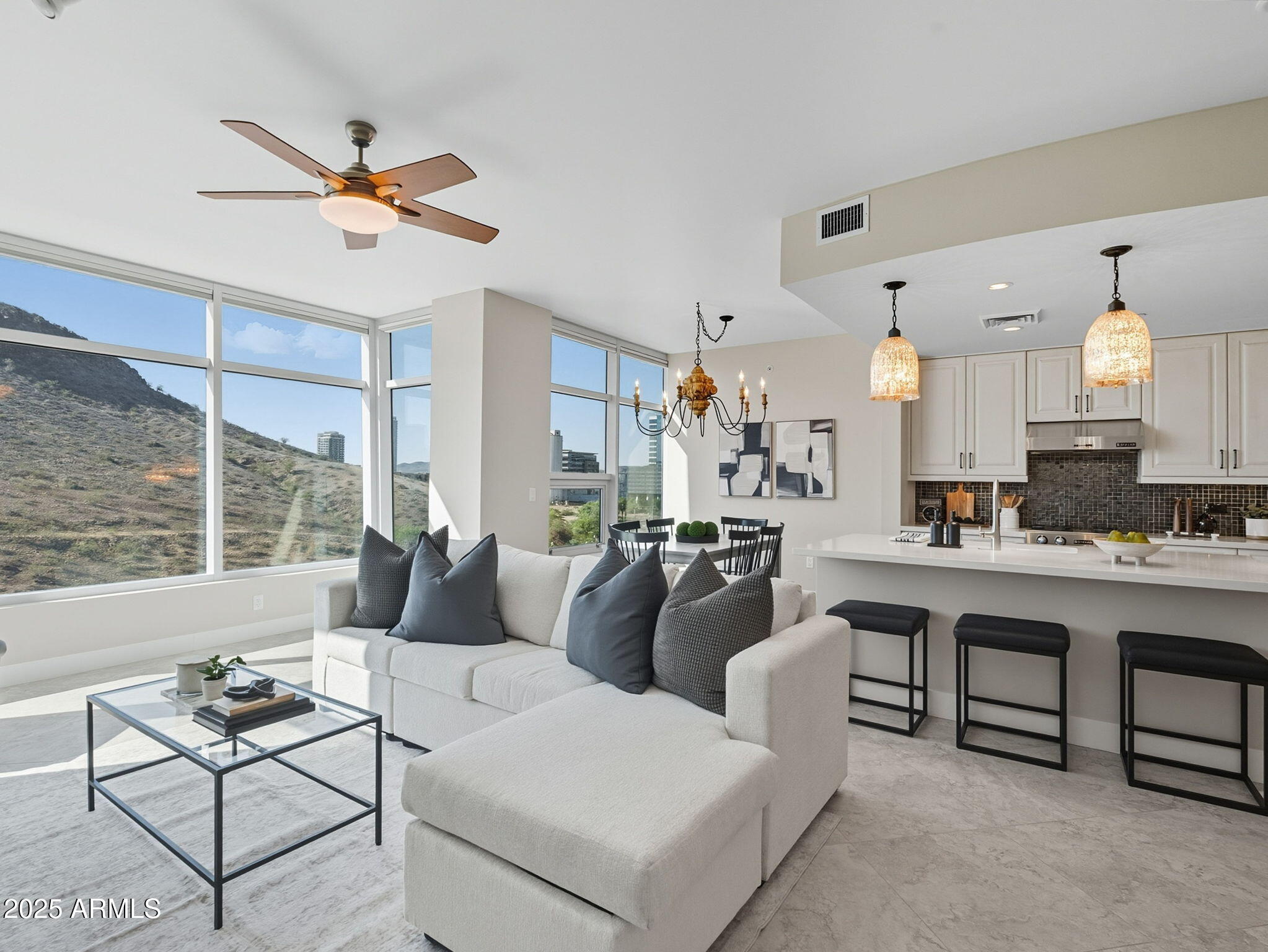 140 East Rio Salado Parkway, Unit 512 Tempe, AZ 85281 - Photo 16 of 41 a living room with furniture a chandelier and a window