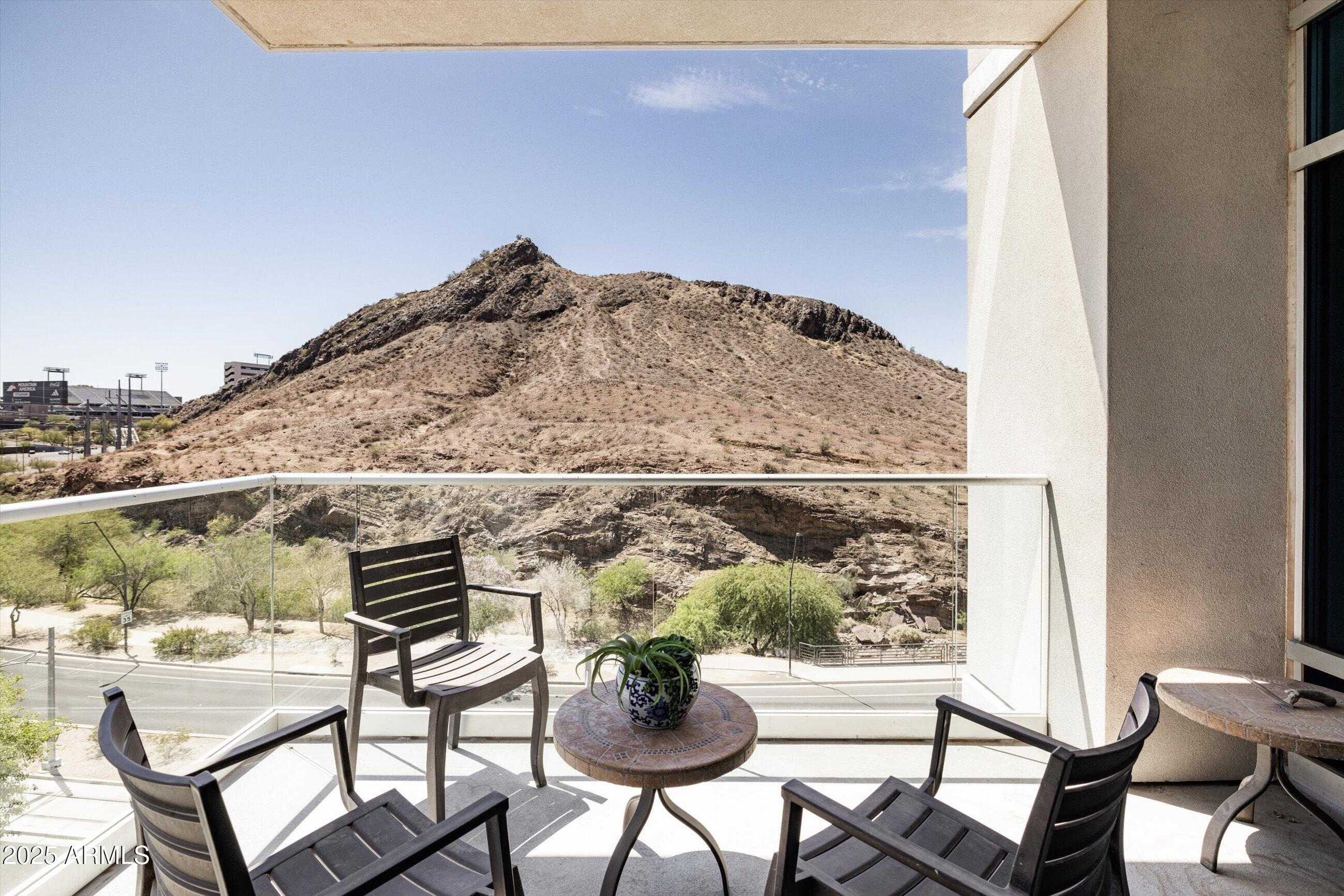 140 East Rio Salado Parkway, Unit 512 Tempe, AZ 85281 - Photo 24 of 41 a view of a chairs and table on the terrace