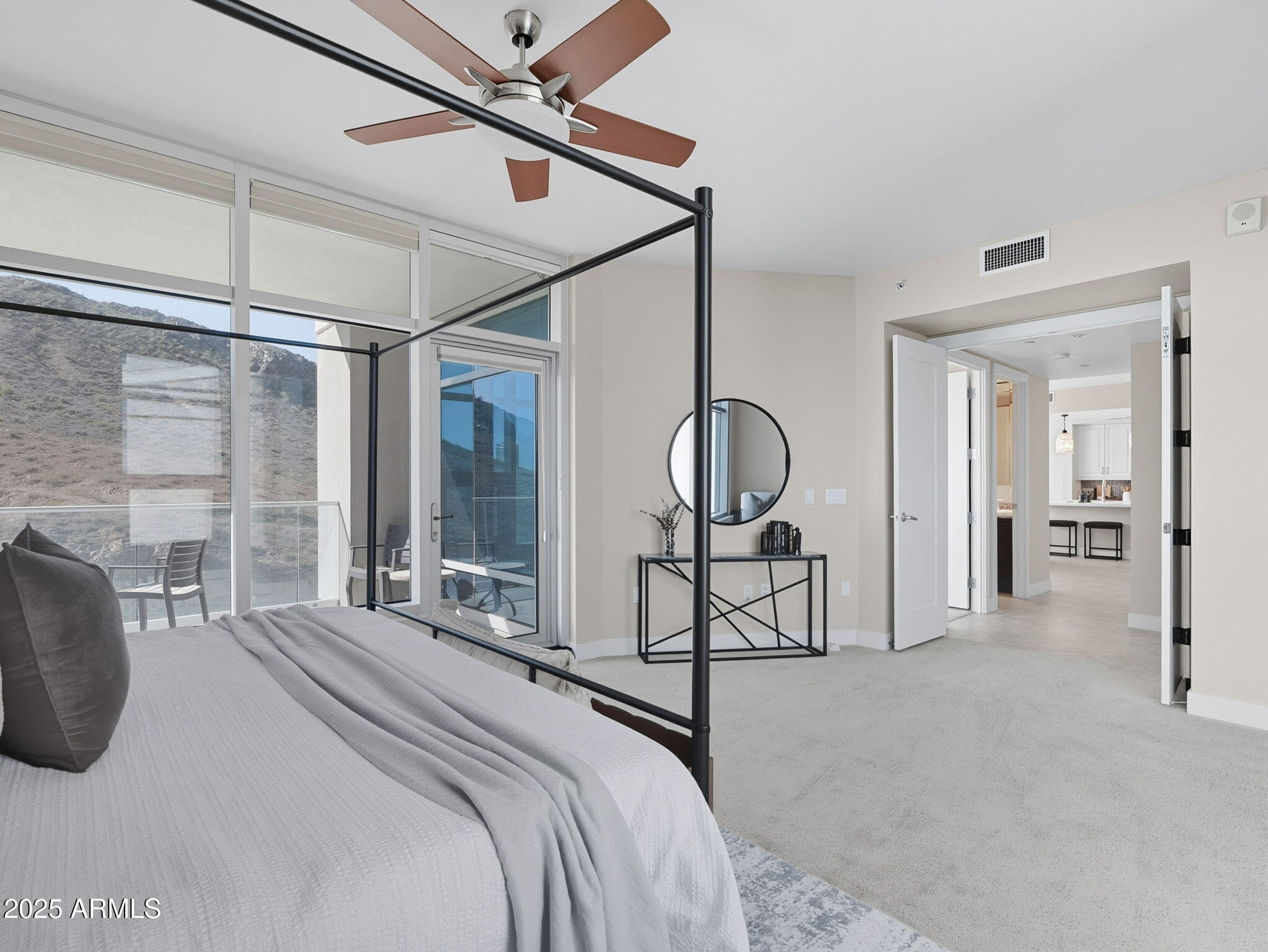 140 East Rio Salado Parkway, Unit 512 Tempe, AZ 85281 - Photo 26 of 41 a bedroom with a bed a mirror and a large window
