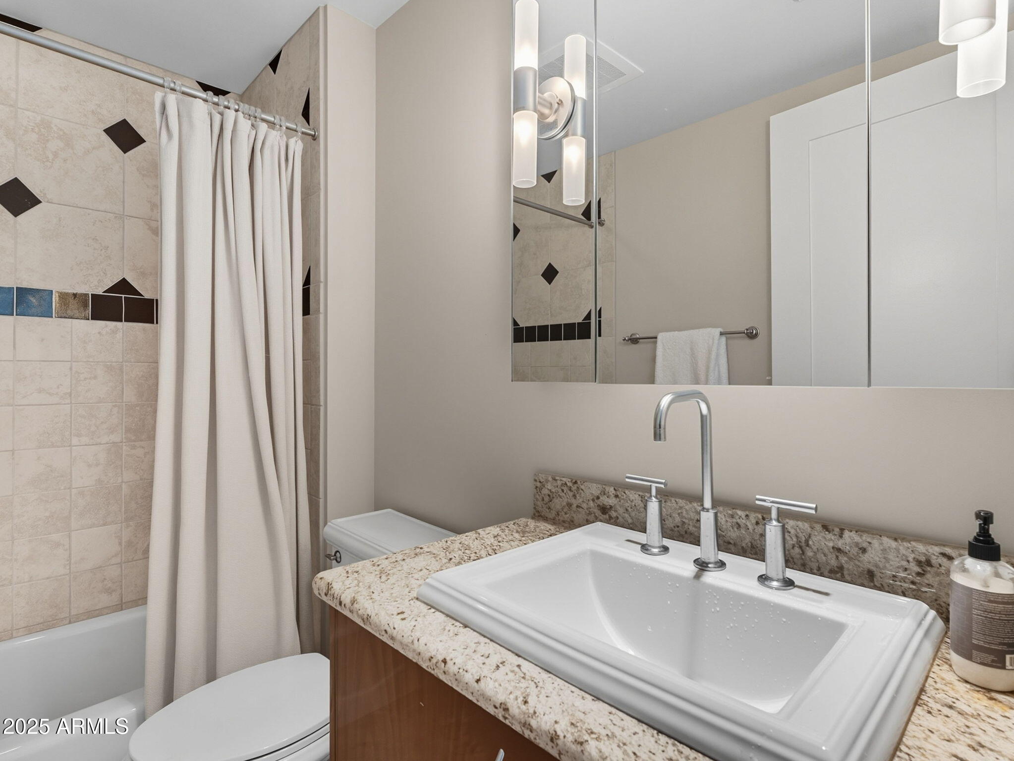 140 East Rio Salado Parkway, Unit 512 Tempe, AZ 85281 - Photo 33 of 41 a bathroom with a sink toilet and shower