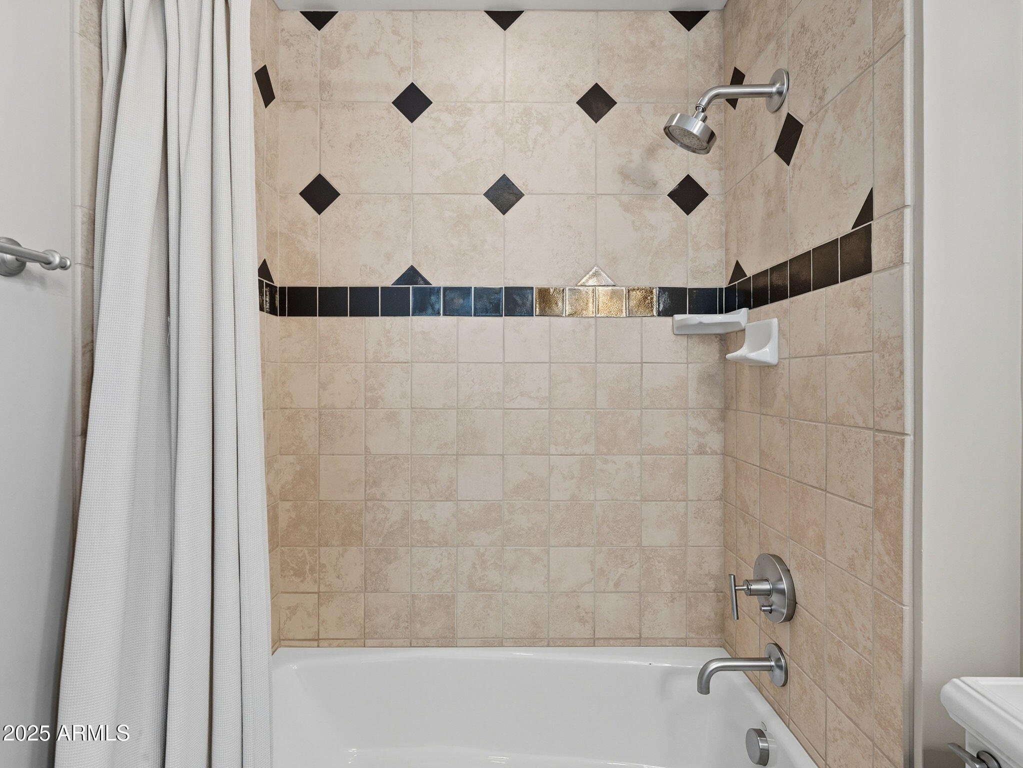 140 East Rio Salado Parkway, Unit 512 Tempe, AZ 85281 - Photo 34 of 41 a bathroom with a shower and a bathtub