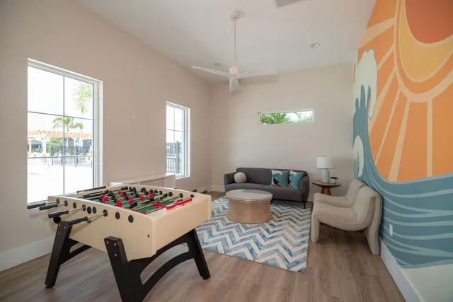 a living room with furniture and a table