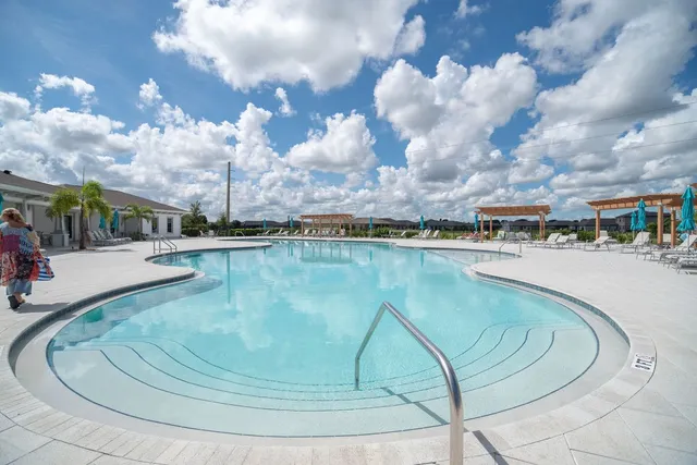 a view of swimming pool from a balcony