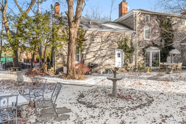a view of a yard with a tree