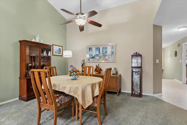 a view of a dining room with furniture