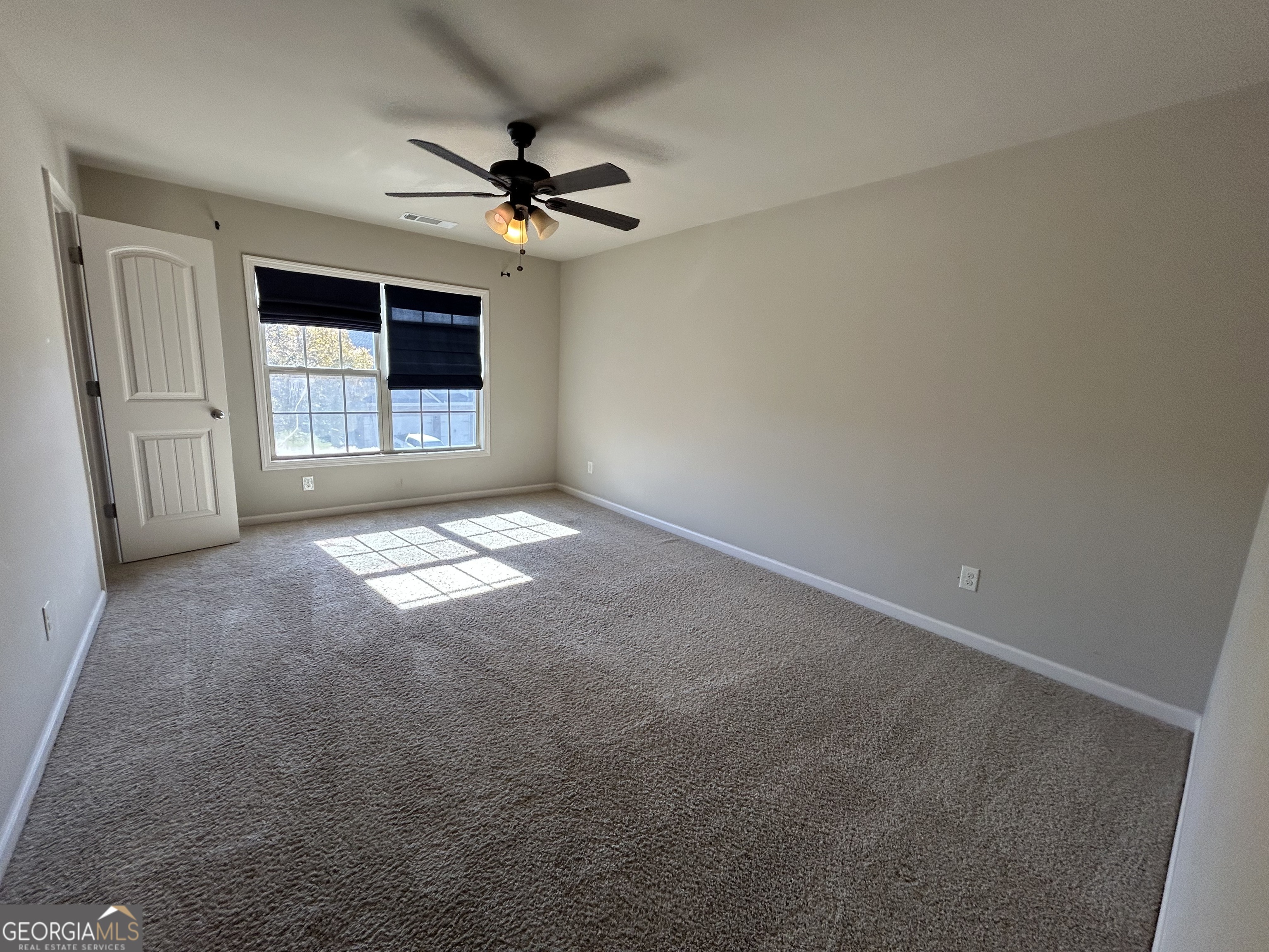 611 Ceremony Way Acworth, GA 30102 - Photo 14 of 20 a view of empty room with windows