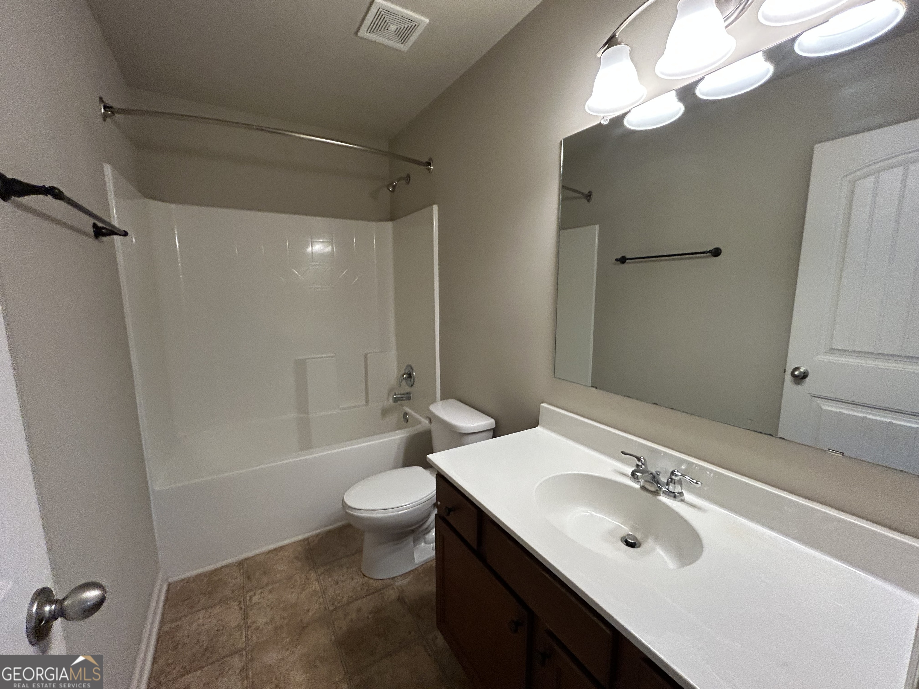 611 Ceremony Way Acworth, GA 30102 - Photo 15 of 20 a bathroom with a sink a toilet and shower