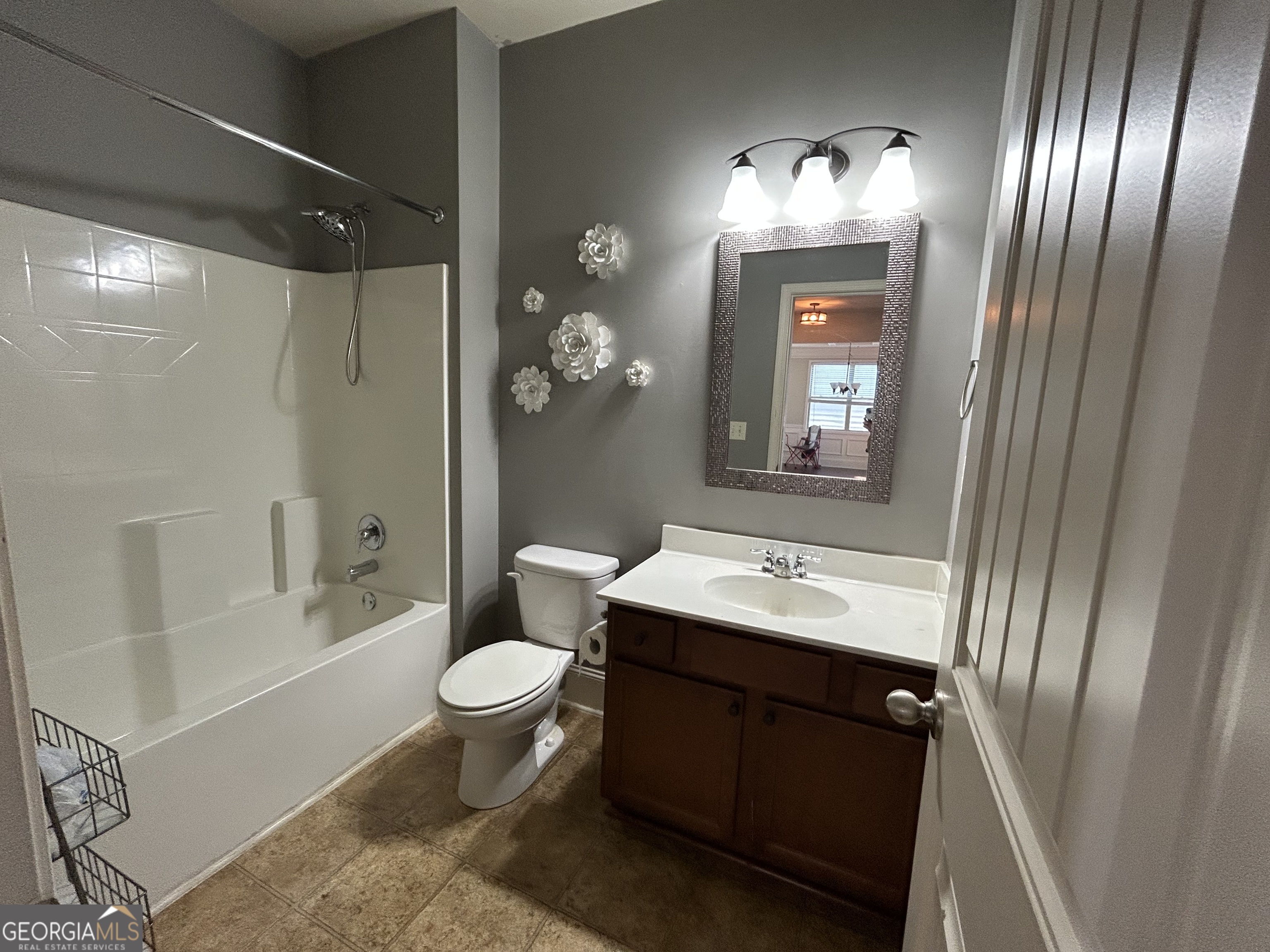 611 Ceremony Way Acworth, GA 30102 - Photo 17 of 20 a bathroom with a sink toilet and shower
