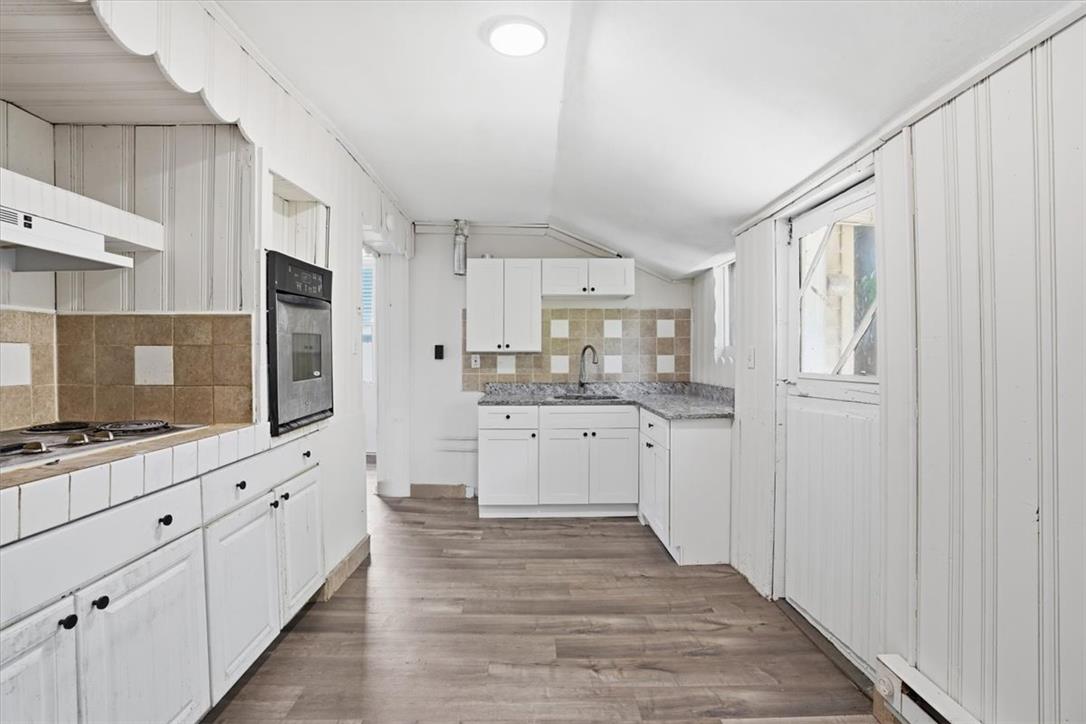 508 Riegel Street Bethlehem, PA 18018 - Photo 5 of 21 a large kitchen with cabinets and wooden floor