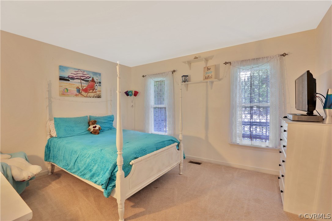 7118 Spring Trace Turn Midlothian, VA 23112 - Photo 15 of 34 a bed room with a bed and a television