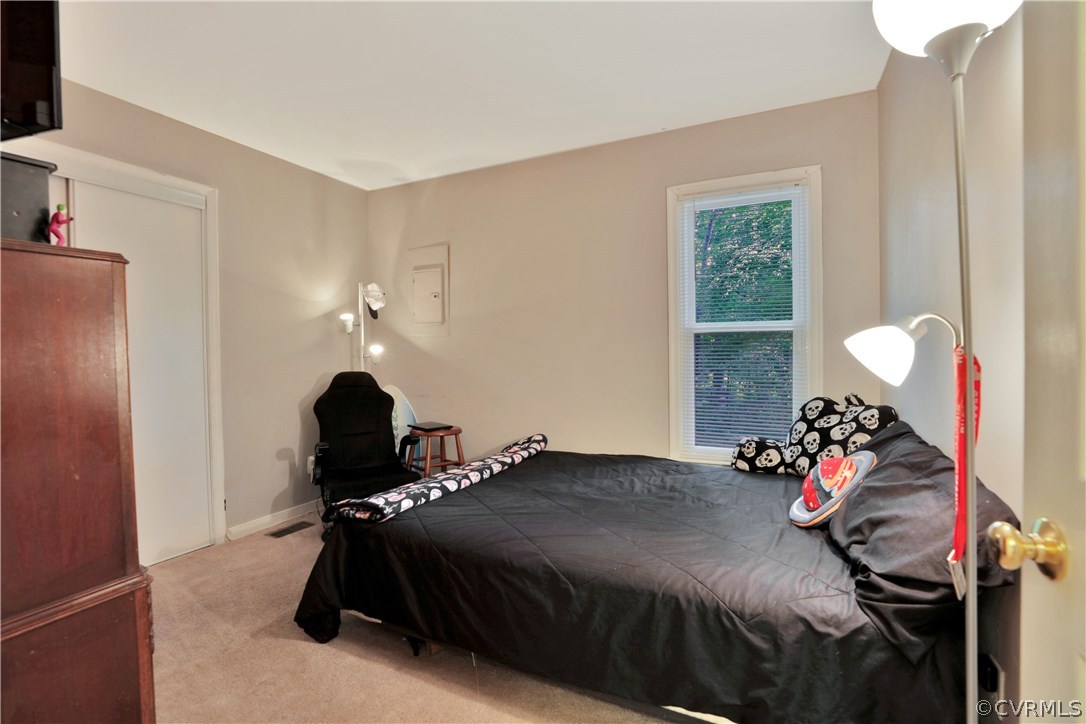 7118 Spring Trace Turn Midlothian, VA 23112 - Photo 16 of 34 a bedroom with a bed and a window