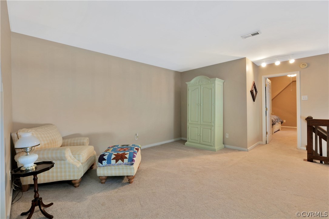 7118 Spring Trace Turn Midlothian, VA 23112 - Photo 20 of 34 a living room with furniture and a flat screen tv