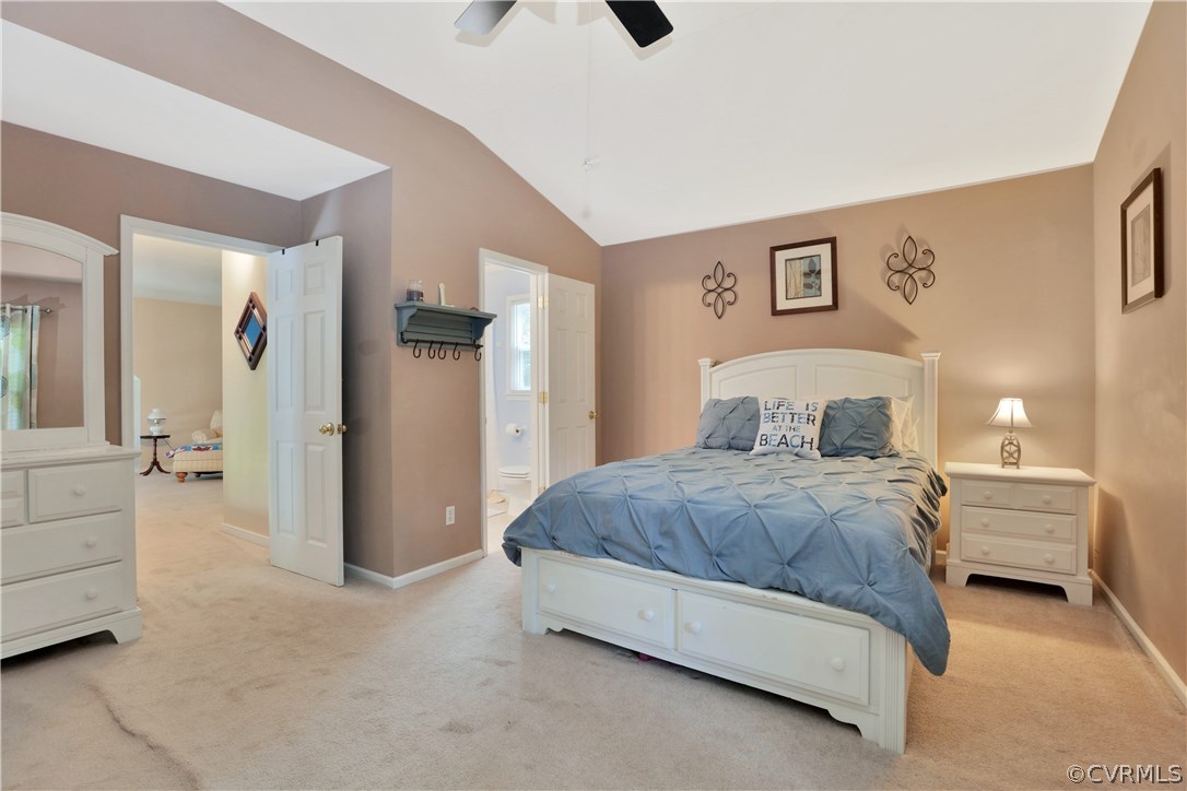 7118 Spring Trace Turn Midlothian, VA 23112 - Photo 23 of 34 a spacious bedroom with a bed and cabinets