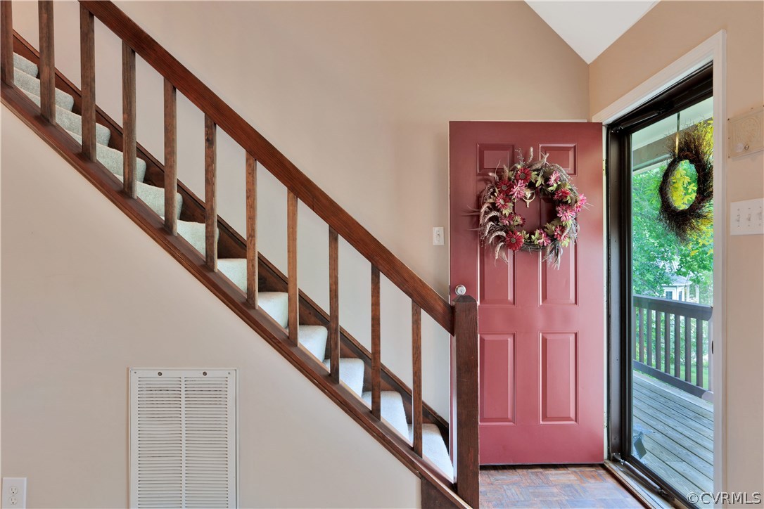 7118 Spring Trace Turn Midlothian, VA 23112 - Photo 4 of 34 a view of staircase with wooden floor and a potted plant