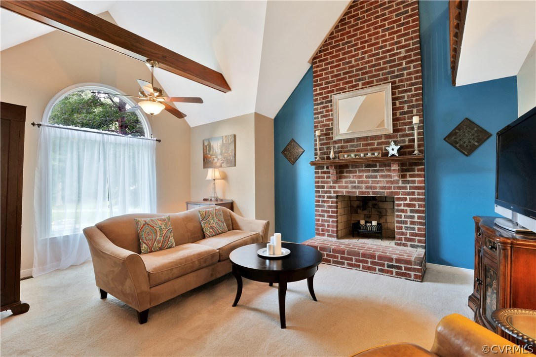 7118 Spring Trace Turn Midlothian, VA 23112 - Photo 7 of 34 a living room with furniture and a fireplace