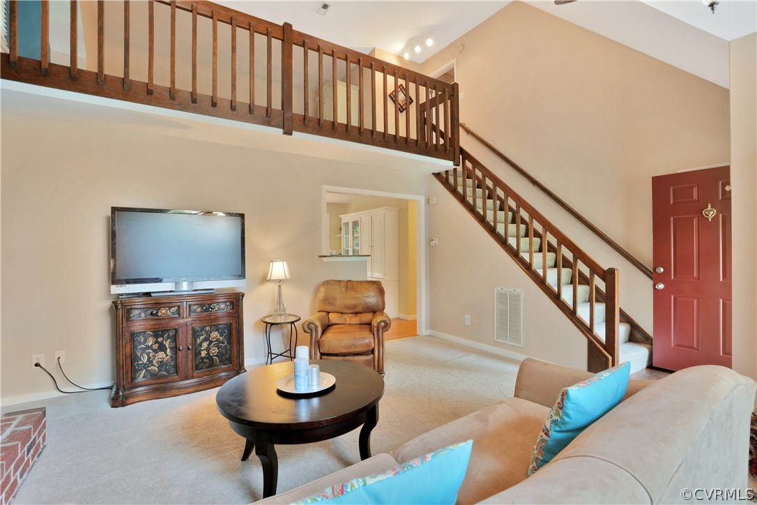 7118 Spring Trace Turn Midlothian, VA 23112 - Photo 8 of 34 a living room with furniture and a wooden floor