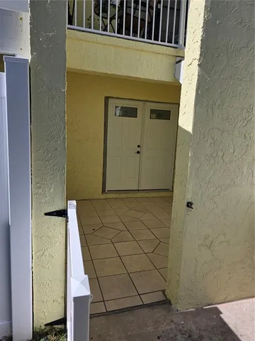 a view of staircase with a couch