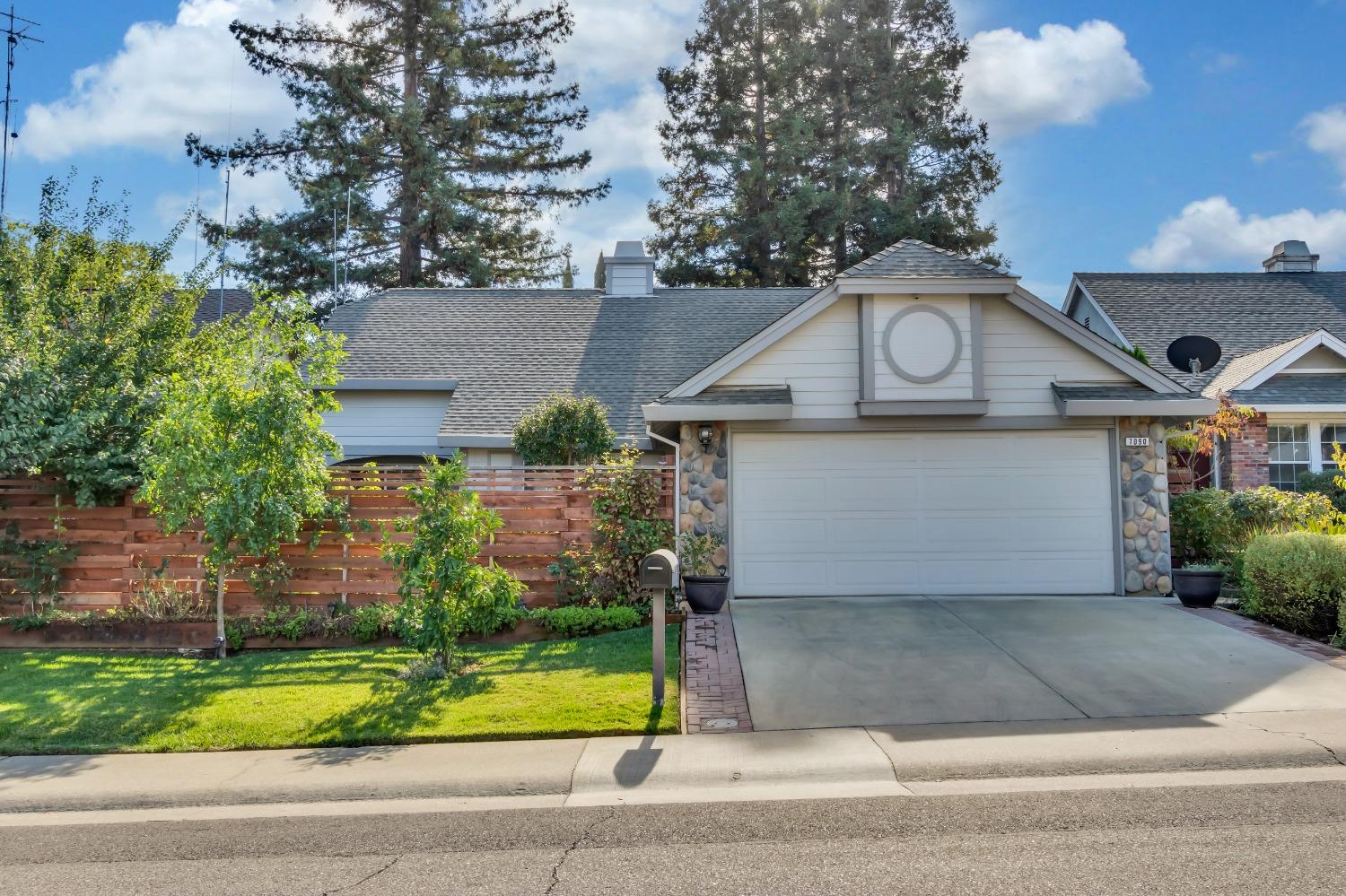 7090 Enright Drive Citrus Heights, CA 95621 - Photo 1 of 1 a view of a house with a yard and potted plants