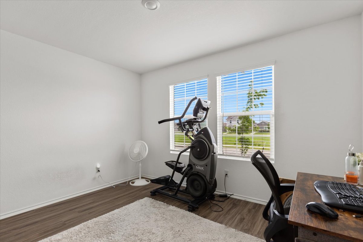 1220 Smallmouth Road Bastrop, TX 78602 - Photo 21 of 29 a view of a room with gym equipment