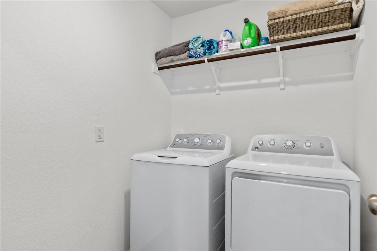1220 Smallmouth Road Bastrop, TX 78602 - Photo 22 of 29 a utility room with dryer and washer