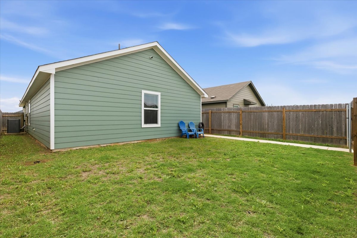 1220 Smallmouth Road Bastrop, TX 78602 - Photo 25 of 29 a view of a backyard