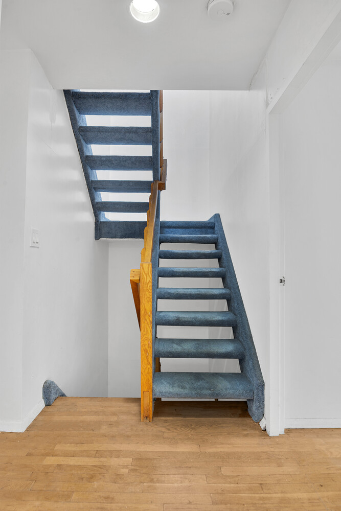 414 West 54th Street, Unit PHE Manhattan, NY 10019 - Photo 6 of 10 a view of entryway and hall with wooden floor