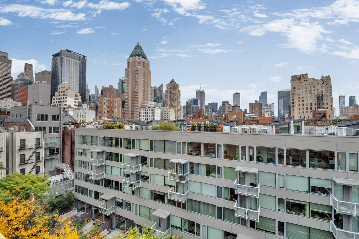 414 West 54th Street, Unit PHE Manhattan, NY 10019 - Photo 9 of 10 a view of a tall building