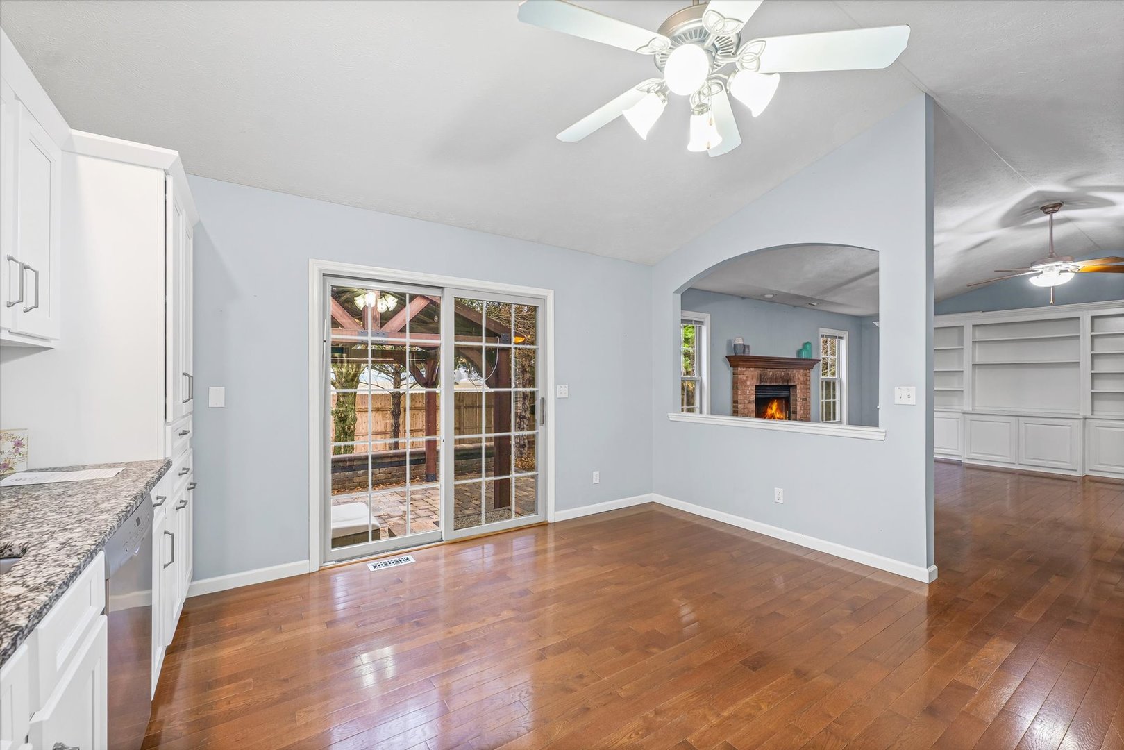 2414 Nugent Circle Urbana, IL 61802 - Photo 11 of 28 a view of empty room with wooden floor and fan