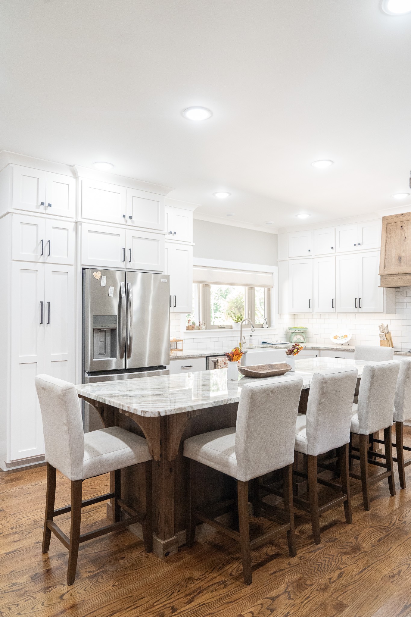 1243 Cave Hill Road Lafayette, TN 37083 - Photo 11 of 32 a dining hall with stainless steel appliances kitchen island granite countertop a dining table and chairs