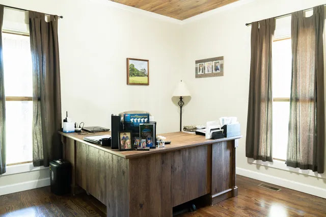 a kitchen with a stove and a refrigerator