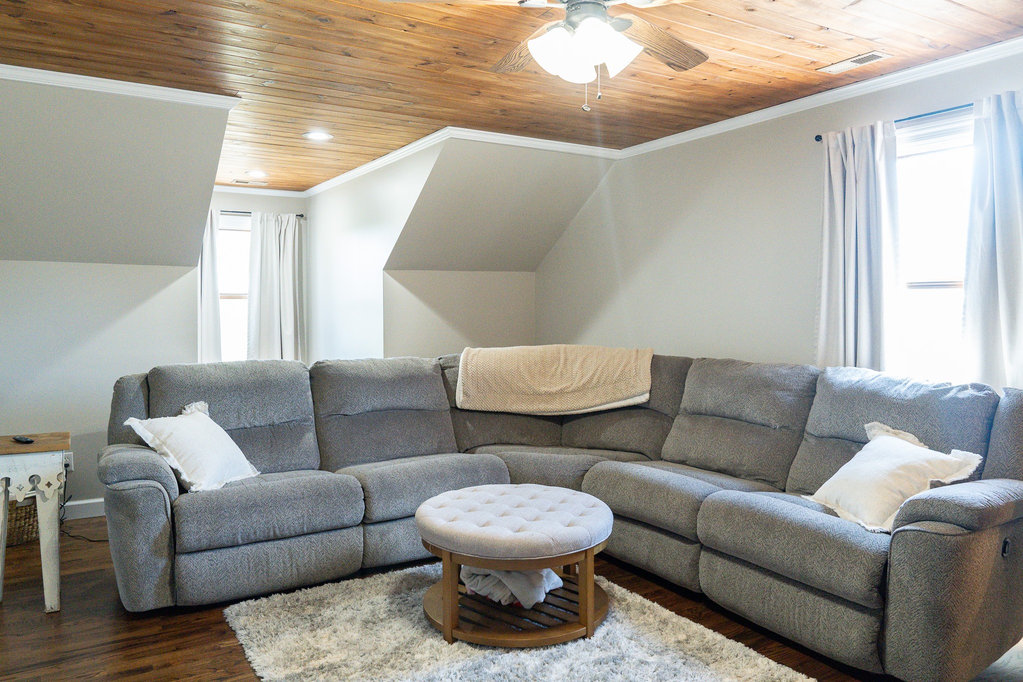 1243 Cave Hill Road Lafayette, TN 37083 - Photo 28 of 32 a living room with furniture and a rug