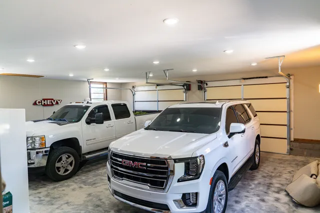 a view of kitchen and a car parked in a parking