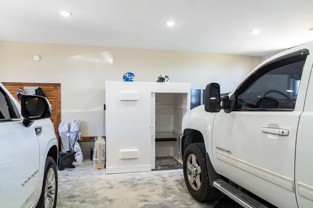 a utility room with sink dryer and washer