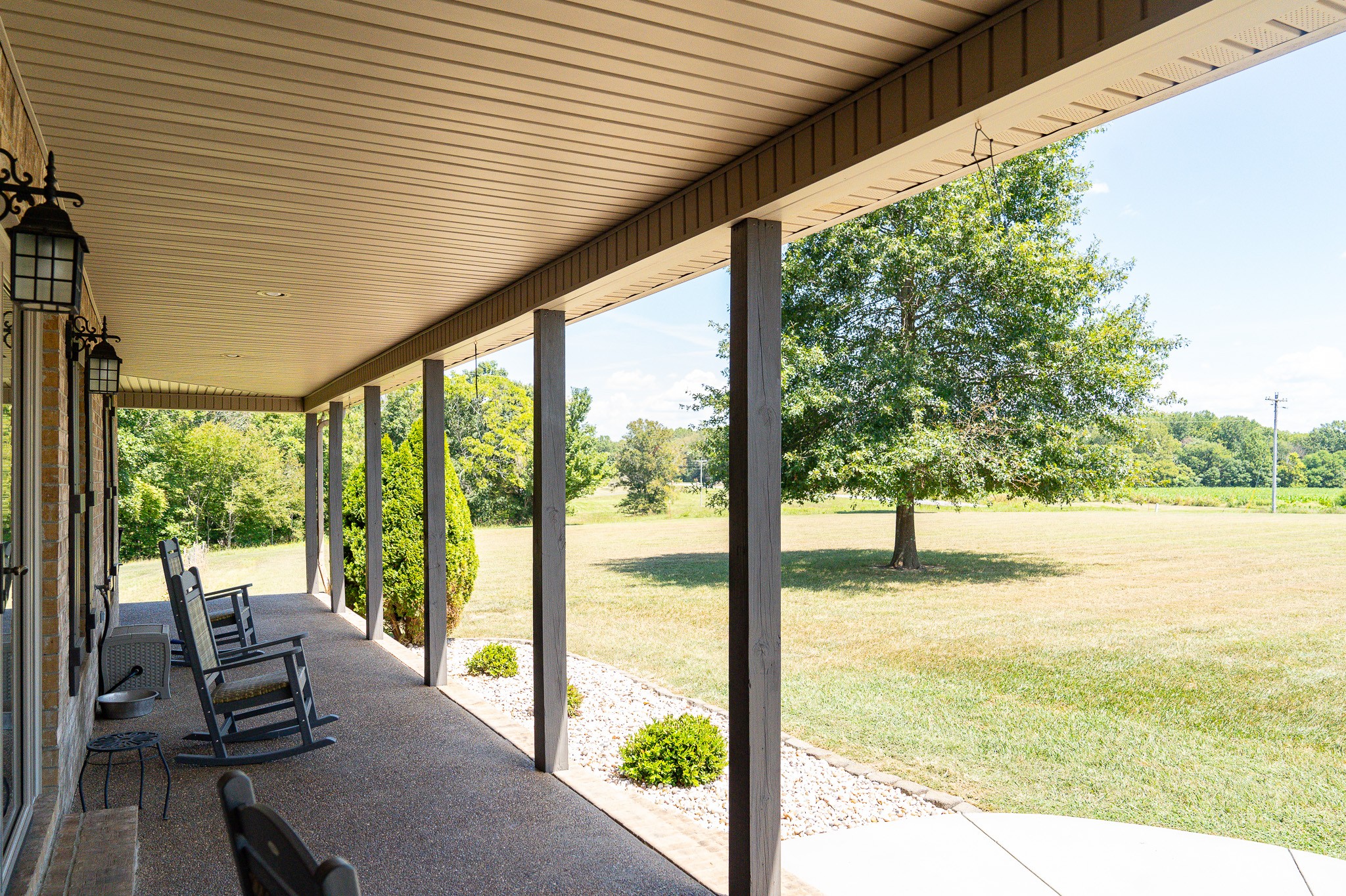 1243 Cave Hill Road Lafayette, TN 37083 - Photo 6 of 32 a view of a living room and floor to ceiling window and wooden fence
