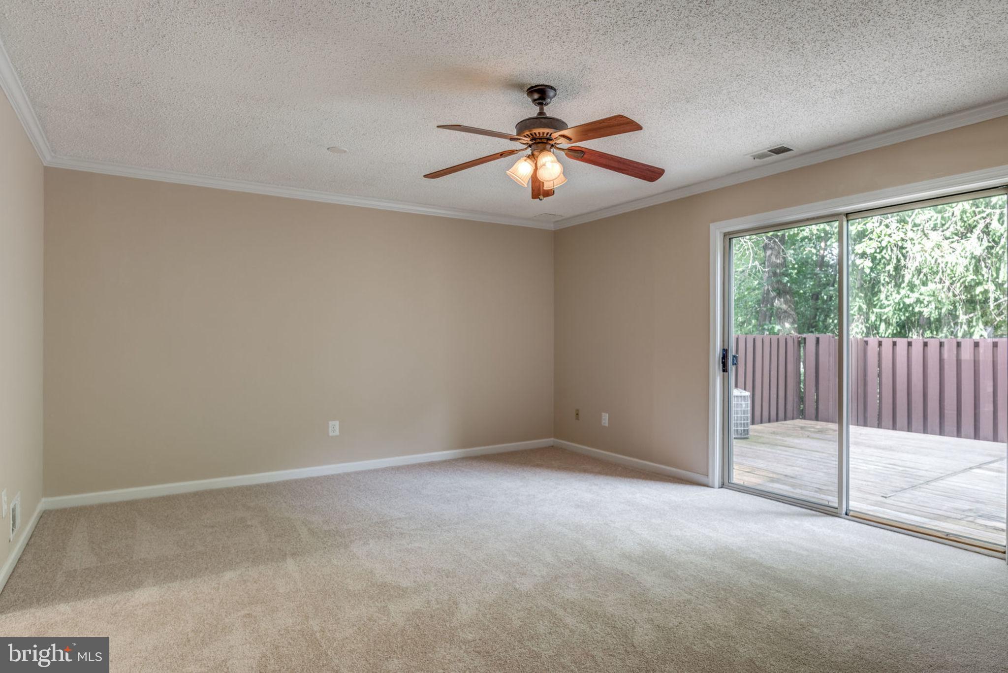 2244 Southgate Square Reston, VA 20191 - Photo 14 of 33 Crown molding and new carpet in the living room
