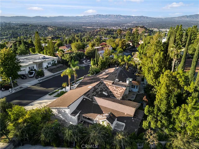 a view of a house with a mountain