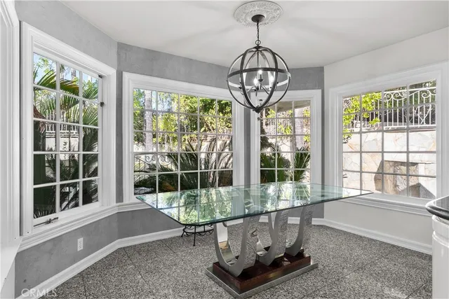 a living room with large windows